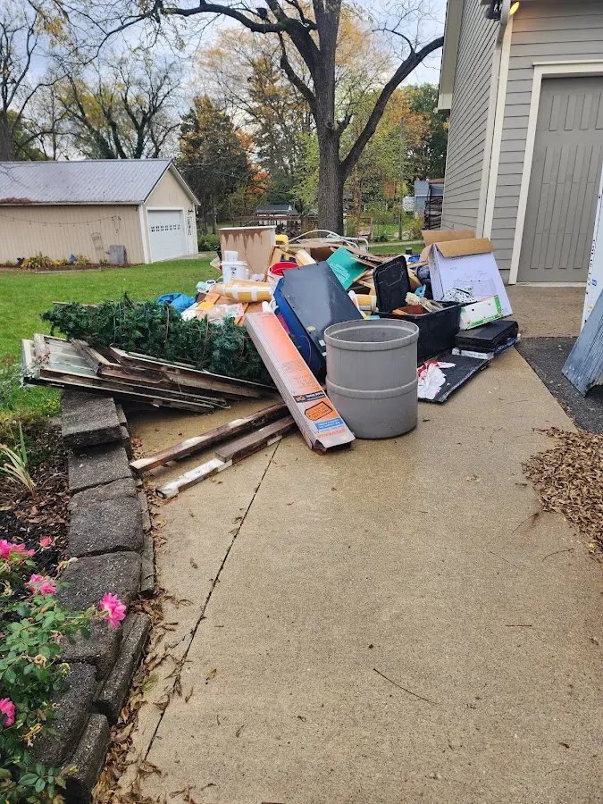 Dumpster being loaded with debris for Commercial Dumpster Rental in Groveport